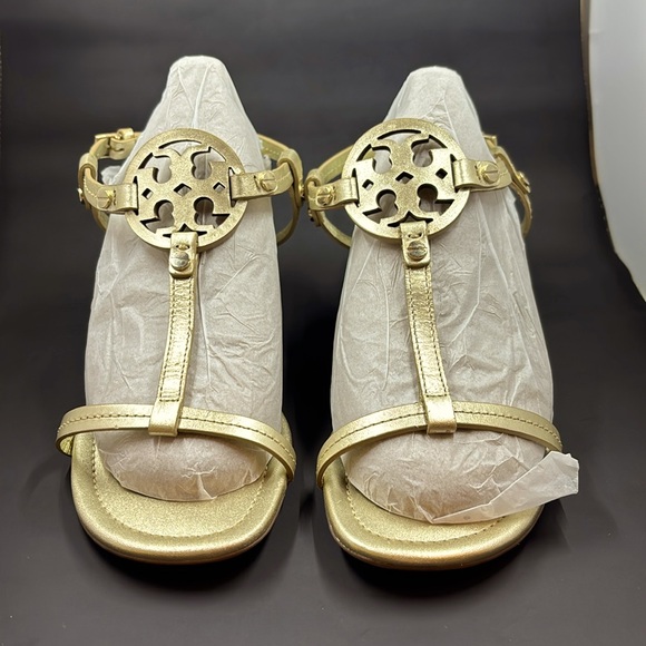 Tory Burch Shoes - Never worn Tory Burch gold leather wedges size 7.5